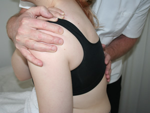 Bill Ferguson osteopath treating patient